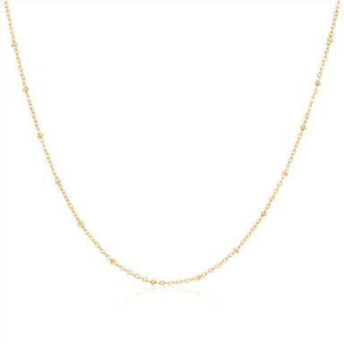 Cadena de bolas chapada en oro.