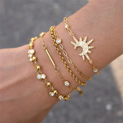Pulseras de circonitas con dijes celestiales