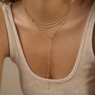 Collar con colgante en forma de Y con cuentas de varias capas
