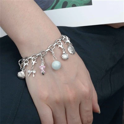 Pulsera con dijes de eslabones ovalados